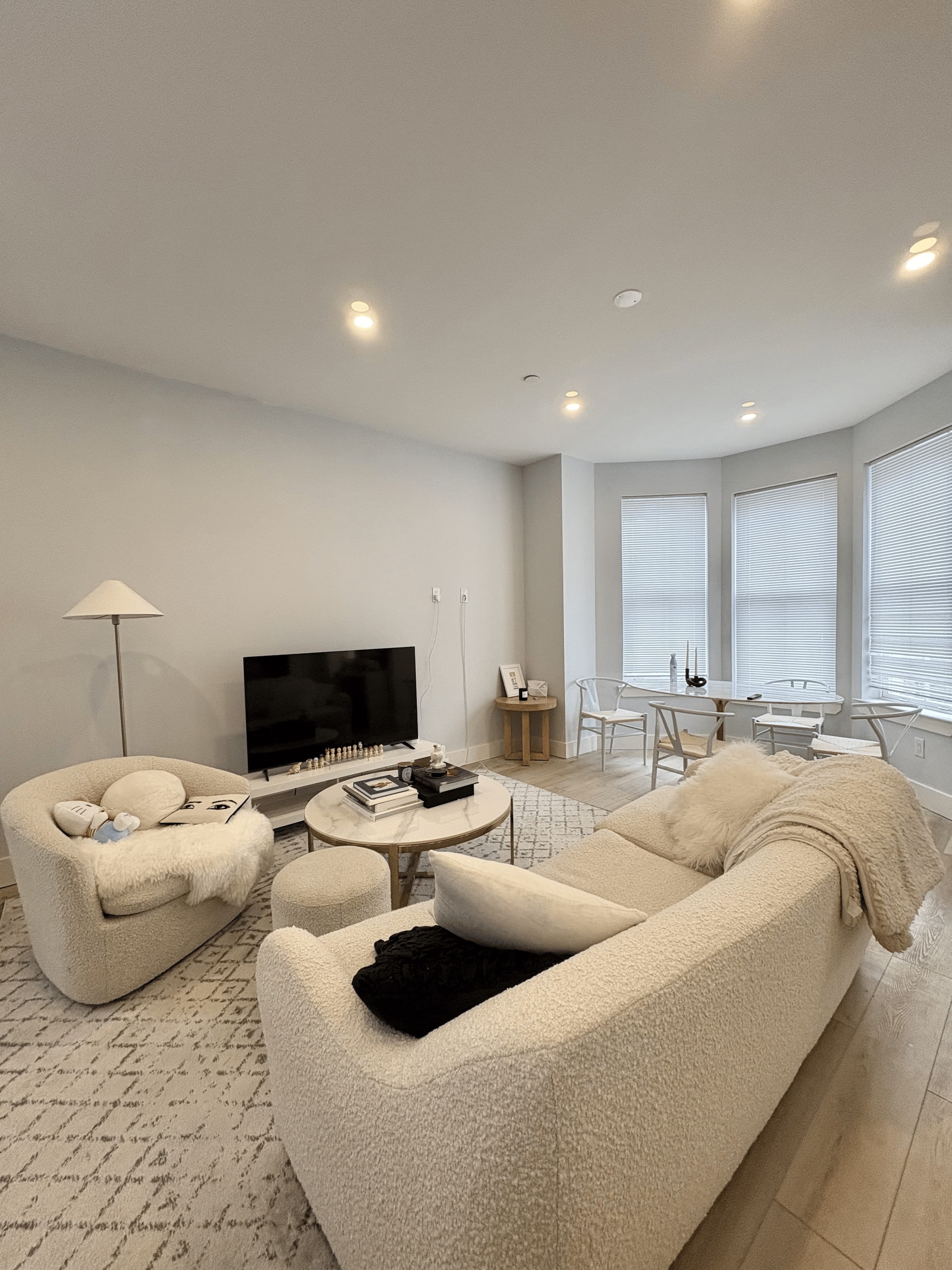 Sunlit living room with refined furnishings