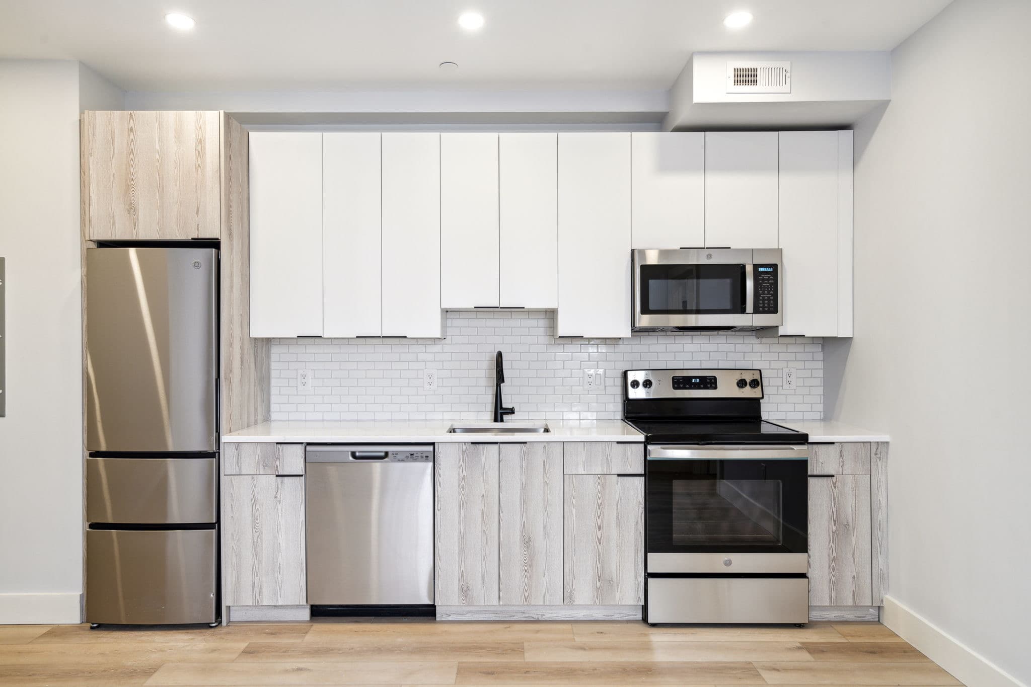Minimalist kitchen with stone counters